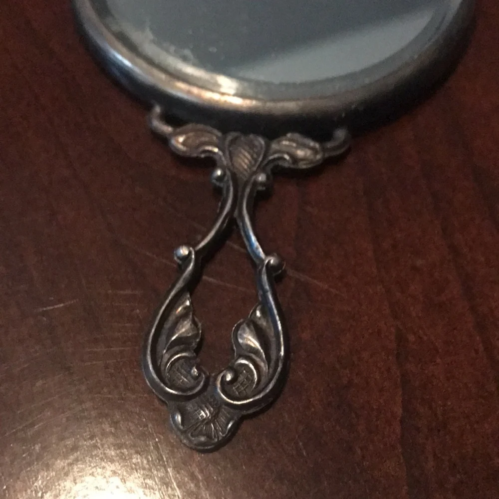 Antique silver small mirror and comb set